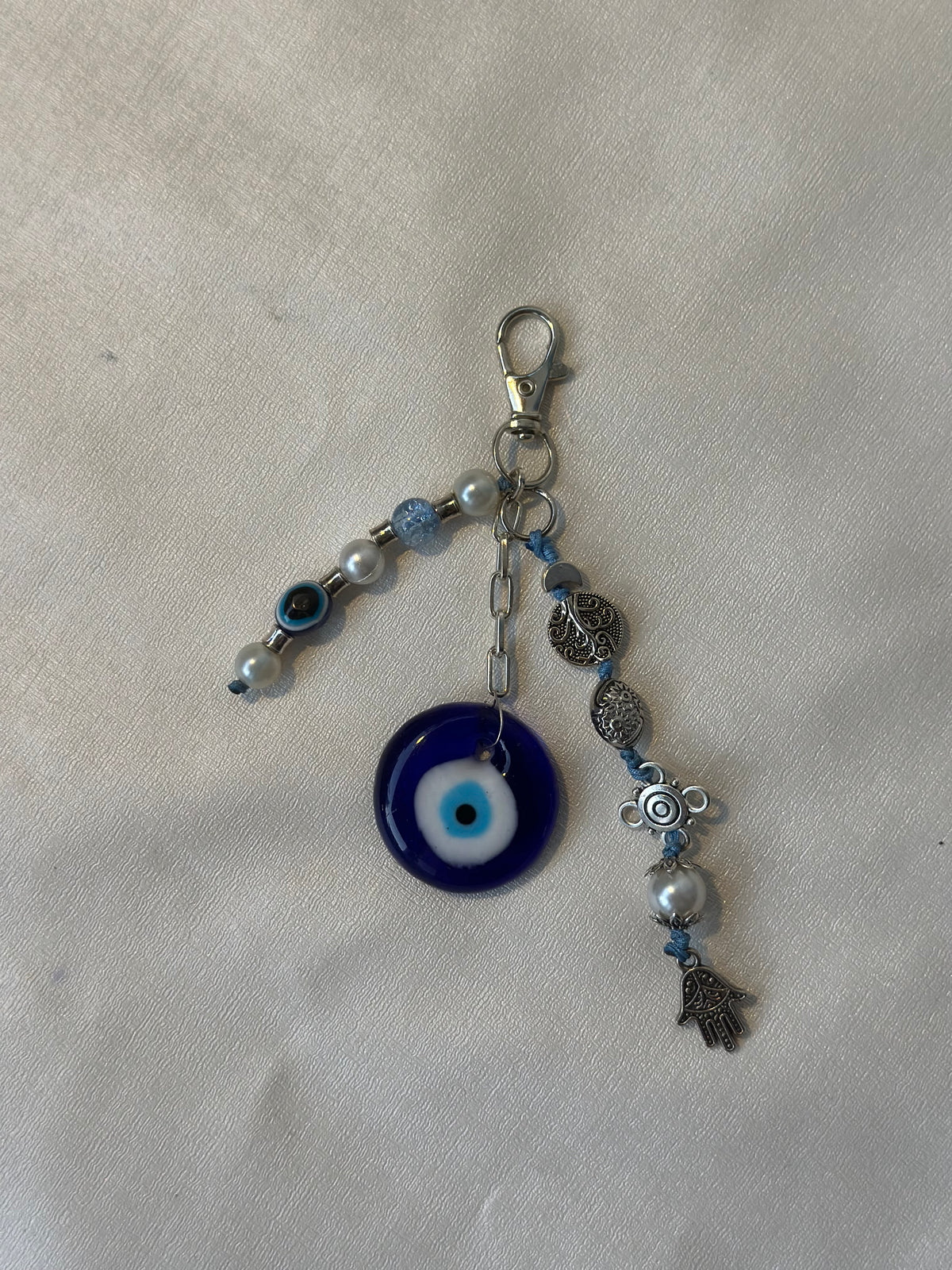 Evil eye charm