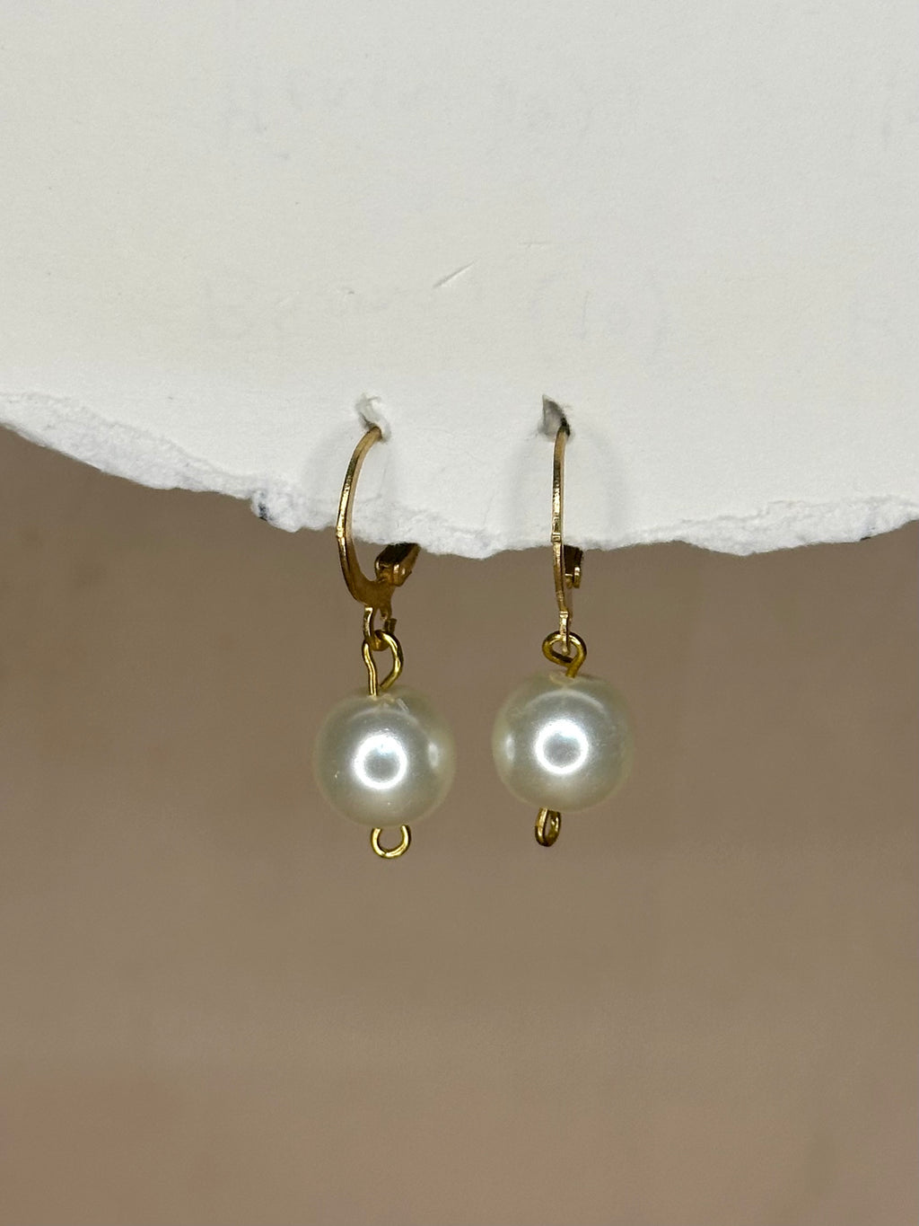 Minimalist handmade pearl drop earrings.